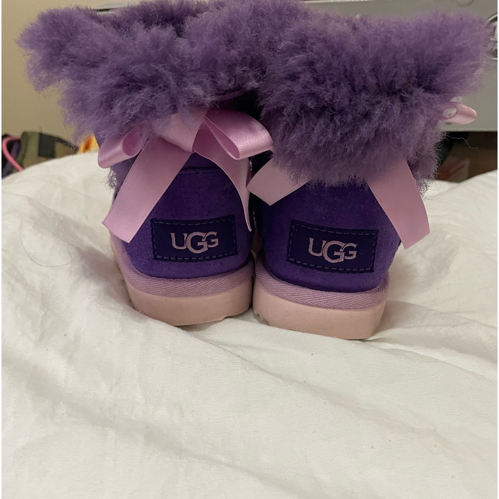 Purple uggs with pink bowtie